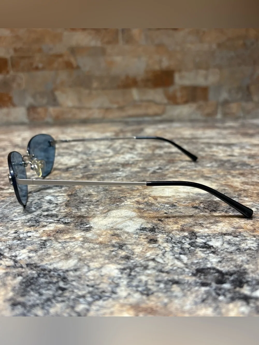 CHANEL 4003 C.103/72 Rimless Silver Blue Lens Titanium Frame Sunglasses
